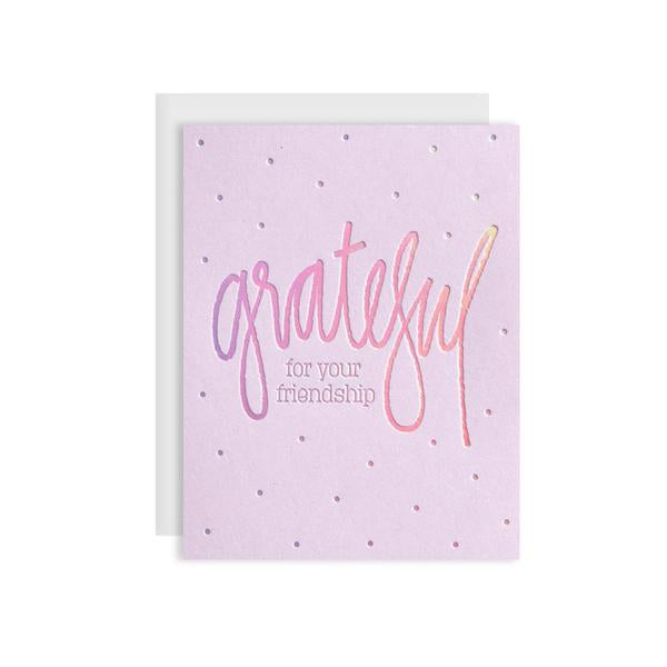 by Kiss and Punch Designs by Julie Stewart. Hand lettered Grateful for your Friendship Rainbow Holographic Foil Card for that special friend. Show that you appreciate their friendship with this spectacular card! Size A2 Paper. Printed on pink lemonade 110 lb. paper. Rainbow foil. A2 ice silver envelope.