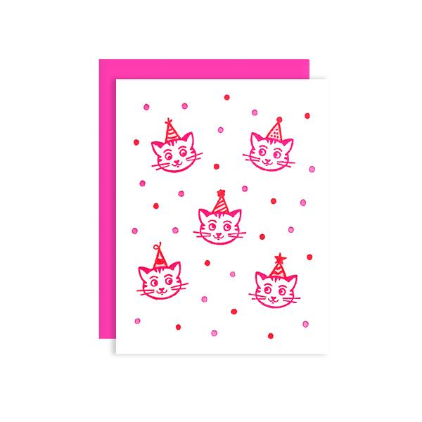 By Loudhouse Creative. Party Cats Card: two-color letterpress printing, hand-drawn illustrations, 100% brilliant white cotton paper, blank inside, matching pink envelope, cello sleeve packaging. Hand-printed on an antique letterpress in Los Angeles, California. Folded card measures 4.25 x 5.5 inches. Also available in store at FOLD Gallery DTLA