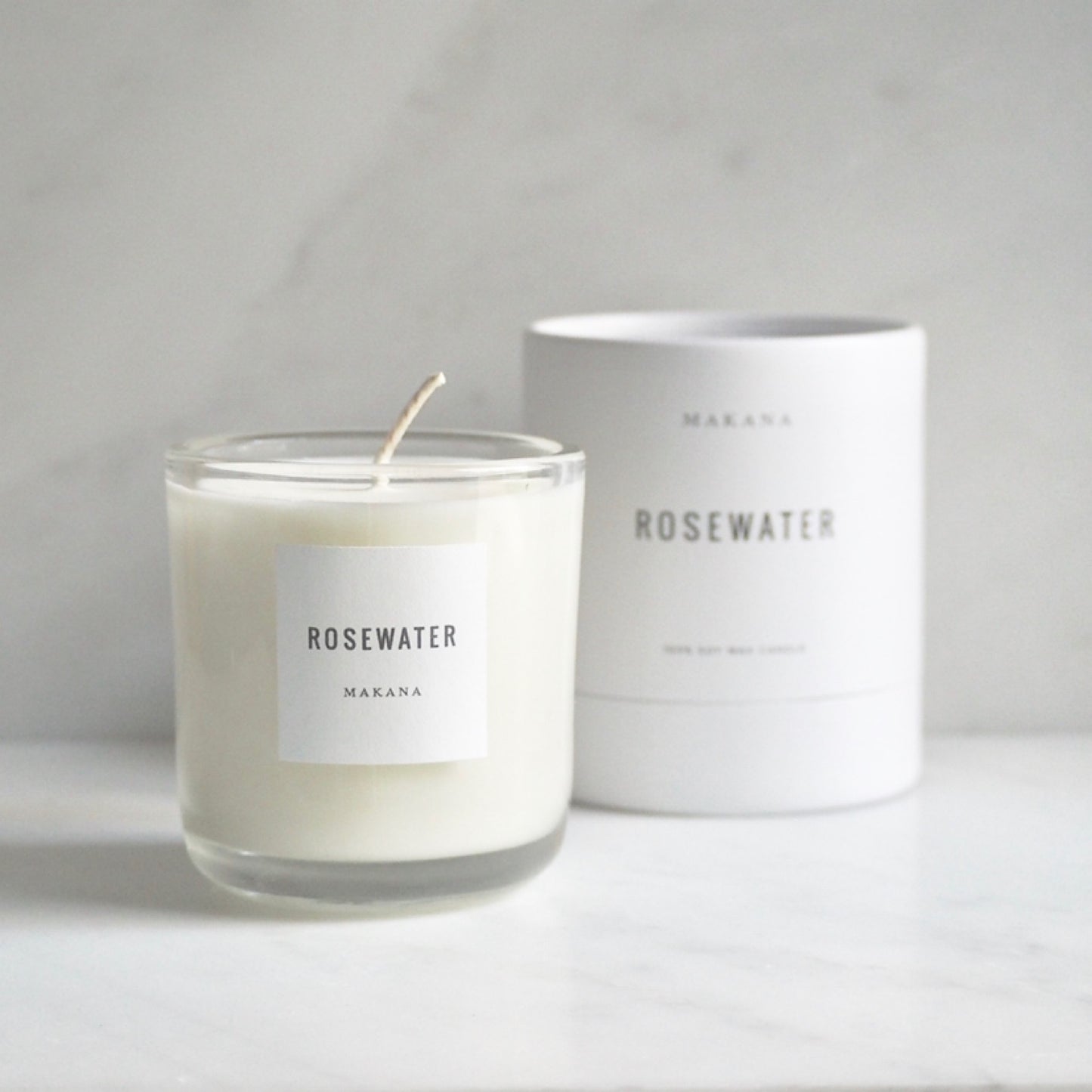 By Makana Candles. Rosewater Candle: A soft garden rose fragrance with a citrus undertone. Notes of geranium and violet are revealed, while vetiver and rosewood lightly ground this beautiful scent. Hand-poured in-house in small batches using simple, clean ingredients.