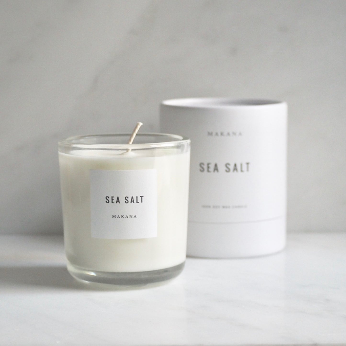 By Makana Candles Sea Salt Candle: Traveling across thousands of miles, tropical trade winds carry notes of fresh sea salt with hints of lush island foliage and flora. This fragrance is reminiscent of warm, breezy coastal days when beyond the horizon, the sky magically meets the sea.