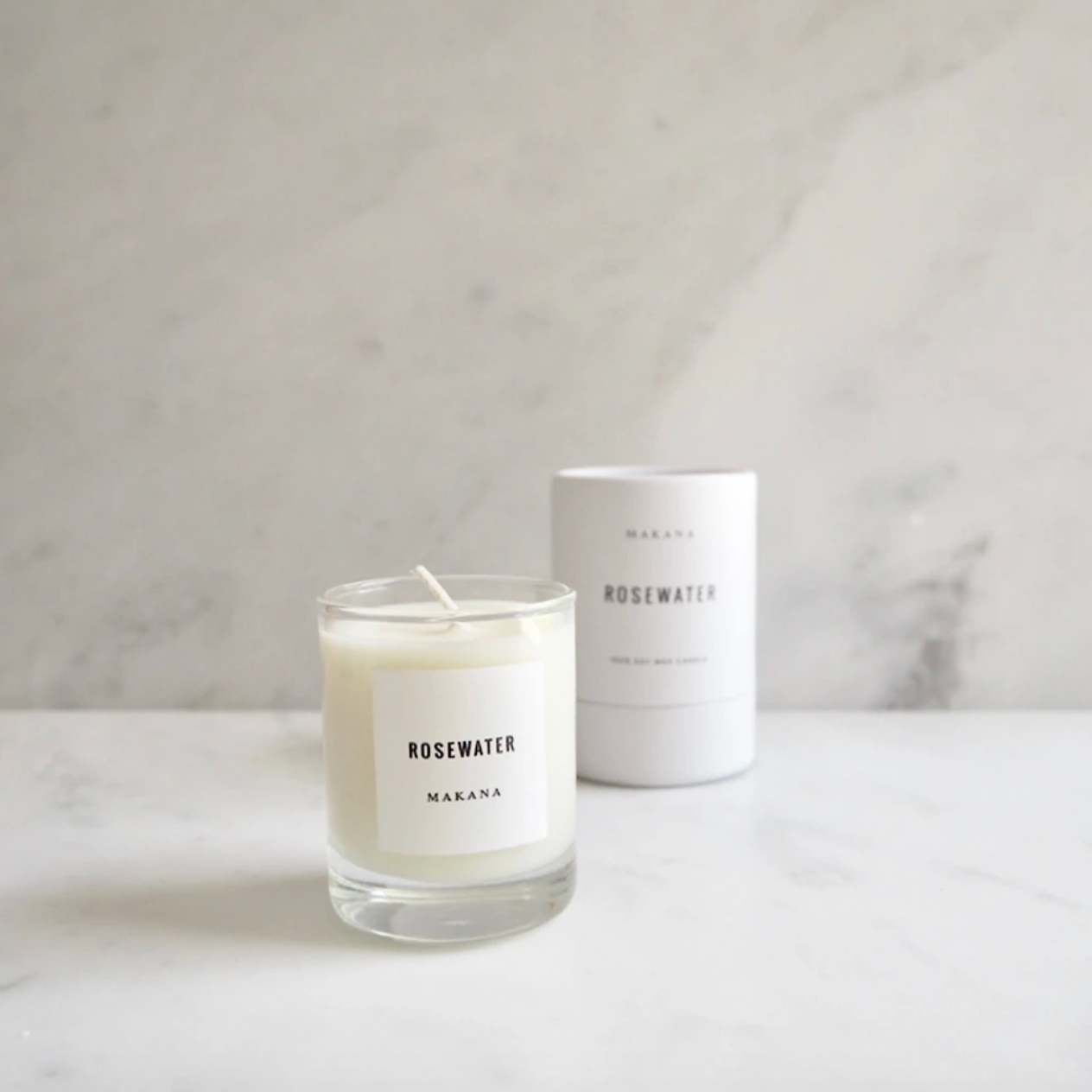 By Makana Candles. Rosewater Candle: A soft garden rose fragrance with a citrus undertone. Notes of geranium and violet are revealed, while vetiver and rosewood lightly ground this beautiful scent. Hand-poured in-house in small batches using simple, clean ingredients.