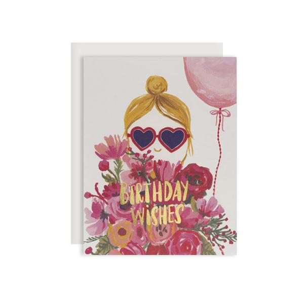 By Red Cap Cards. Heart Shaped Glasses Card: Foil. 100lb Heavyweight Cardstock. Illustrated by Carolyn Gavin. Measures 4.25 x 5.5 inches. Also available in store at FOLD Gallery.