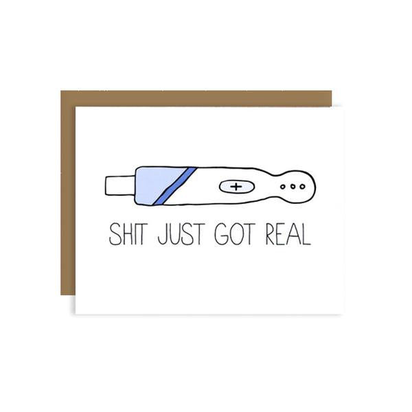 By Unblushing by Julie Ann Art. Shit Got Real Pregnancy Card. The perfect card to announce a pregnancy, or congratulate a pregnant friend in the most honest way. A2 100% recycled kraft envelope. Professionally printed on 110# recycled card stock. Packaged in a compostable clear sleeve. Blank inside. Measures 5.5 x 4.25 inches (A2) folded card. Also available in store at FOLD Gallery DTLA.