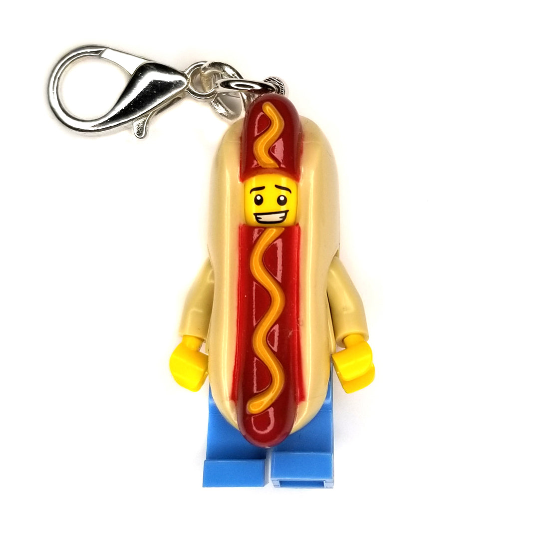 By Miss Brixx. Lego® Hot Dog Keychain. Silver color Lobster Clasp connectors. Lego figure measures approximately 2cm x 4cm.