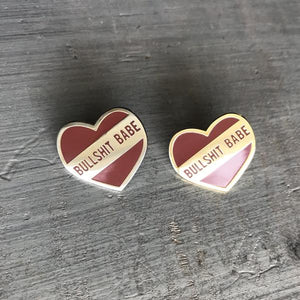 by 1606 Supply Co. This listing is for one Bullshit Babe Enamel Pin. Gold-plated and very shiny. Rubber pin back included. Measures 0.75 x 0.75 inches. Also available in store at FOLD Gallery in DTLA.