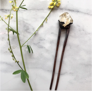 By Aerow. Citrine Hair Pin. Sometimes you’re mid-epiphany, scribbling notes for your next massive project or venture, and your hair gets all up in your face. We know the struggle. That’s why we have these gorgeous gem-tipped hair pins to keep your glorious locks in place while you’re getting down to business. Please allow for slight variation in stone size, shape and color as each stone is unique.