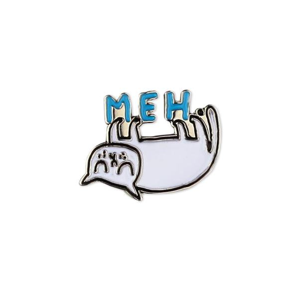 By Badge Bomb. Soft enamel Meh Cat Pin by artist Gemma Correll. Measures 1.25 inches. Also available in store at FOLD Gallery DTLA.
