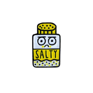 By Badge Bomb. Salty Pin. Enamel pin illustrated by Gemma Correll. Measures approximately 0.5 x 1 inch. Also available in store at FOLD Gallery DTLA.