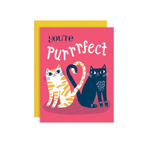 By Badge Bomb. You're Purrrfect Cats Card. Blank Inside. Printed with soy ink in the USA. FSC certified 100% post-consumer recycled paper. Packaged in plastic sleeves with recycled envelope. Measures 4.25 x 5.5 inches. A2 size greeting card. FOLD Gallery Dtla.