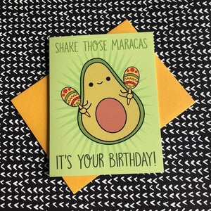 by Bored Inc. Shake those Maracas, it's your birthday! This dancing Cha Cha the Avocado Birthday Card makes the perfect birthday greeting! This greeting card is blank inside and comes with textured yellow gold envelope. Card is professionally printed on heavyweight matte cardstock. Available in store at FOLD Gallery.