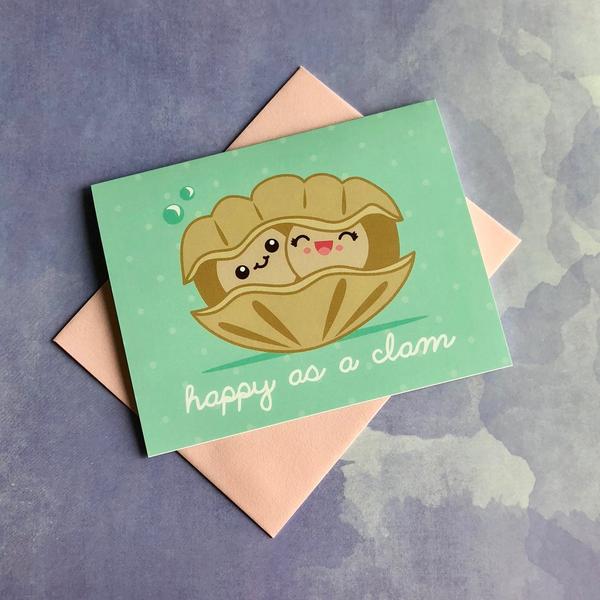 by Bored Inc. Super-cute Happy as a Clam Card. Perfect to send to someone you love! Card is blank inside and comes with pink envelope. Professionally printed using high quality, archival dye based inks on a heavyweight matte card. Measures 4 1/4 x 5 1/2 inches.
