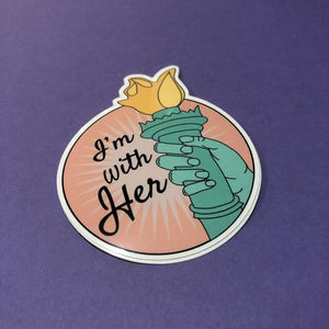 by Bored Inc. Show your support for Lady Liberty and all she stands for with this I’m With Her Sticker. Designed by Danielle Salazar. This durable, vinyl sticker is waterproof with an outdoor life of 3-5 years and is even dishwasher safe. Measures 3 x 3 inches. Also available in store at FOLD Gallery DTLA.