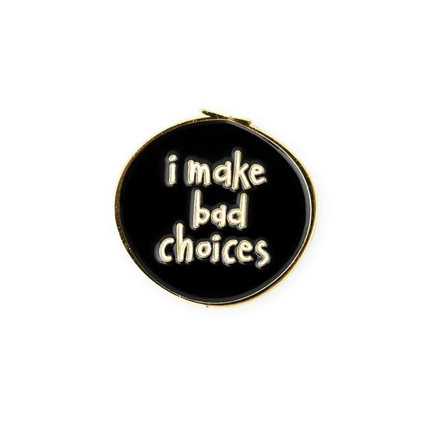 by Carolyn Draws. Enamel I Make Bad Choices Pin with gold colored plating and a gold butterfly clasp on the back. Measures 1 inch in diameter. Also available in store at FOLD Gallery DTLA.