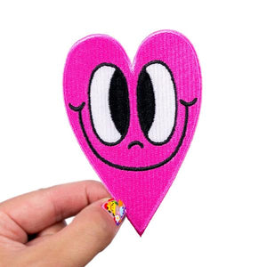 By Chris Uphues. High quality Crosseyed Hot Pink Heart Patch. 100% embroidered, iron-on. Measures approximately 4 x 2.75 inches. Also available in store at FOLD Gallery in DTLA.