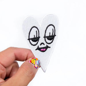 By Chris Uphues. High quality, 100% embroidered, iron-on Little Ghost Heart Patch. Measures approx. 2.5 x 1.5 inches. Also available in store at FOLD Gallery DTLA.