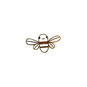 By Chris Uphues. This Mini White Golden Bee Pin is made with super shiny gold plated metal and filled with smooth, high quality, glossy enamel. Pin comes with a rubber clutch for extra grip. Perfect for gifting! Pin measures 1 inch wide. Also available in store at FOLD Gallery DTLA.