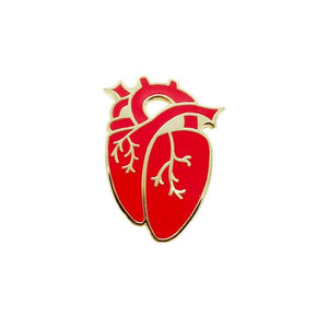 By City of Industry. An Anatomical Heart Pin with gold plating. Measures approximately 1.25 inch long. Also available in store at FOLD Gallery.
