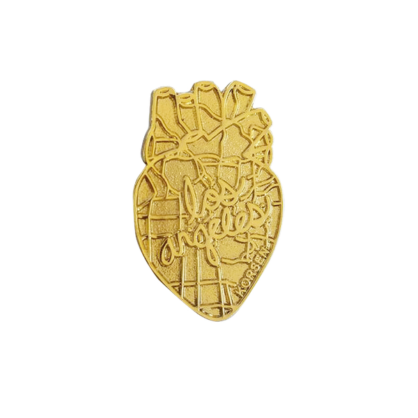 By Jennifer Korsen. Limited edition die struck Los Angeles Heart of Gold Pin showing the Los Angeles freeway system. Measures 1 x 1.5 inches. Also available in store at FOLD Gallery DTLA.