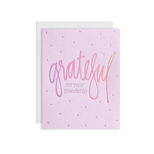 by Kiss and Punch Designs by Julie Stewart. Hand lettered Grateful for your Friendship Rainbow Holographic Foil Card for that special friend. Show that you appreciate their friendship with this spectacular card! Size A2 Paper. Printed on pink lemonade 110 lb. paper. Rainbow foil. A2 ice silver envelope.