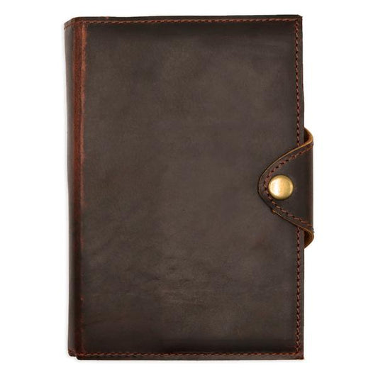 By Kodiak Leather. The Drifter Leather Journal in Dark Walnut is made from Full Grain leather and complete with a snap button closure, this journal is the ultimate gift item for the world traveler or home body. 210 blank pages.Handmade artisan paper. Refillable. Measures 5 x 7 x 2.5 inches.