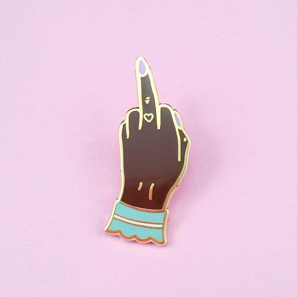 By Little Arrow. Boy Bye Pin - Dark is a cloisonné enamel pin set in 22kt plated gold. Comes with a rubber clutch. Measures 0.5 x 1.25 inches. Also available in store at FOLD Gallery in DTLA.