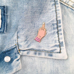 By Little Arrow. Boy Bye Pin - Light is a cloisonné enamel pin set in 22kt plated gold. Comes with a rubber clutch. Measures 0.5 x 1.25 inches. Also available in store at FOLD Gallery in DTLA.
