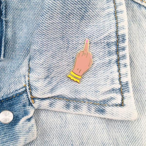 By Little Arrow. Boy Bye Pin - Medium is a cloisonné enamel pin set in 22kt plated gold with rubber clutch. Measures 0.5 x 1.25 inches. Also available in store at FOLD Gallery in DTLA.