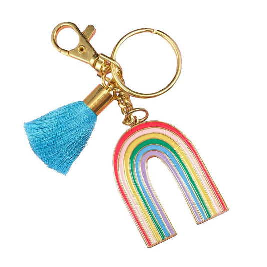 By Little Arrow Studio. Hard enamel Retro Rainbow Keychain in 22kt plated gold. Plated gold hardware and adorned with a silk tassel. Please note that due to everyone’s monitor displaying differently, the colors you see may vary. Measures 2 inch wide x 4.75 inch tall.