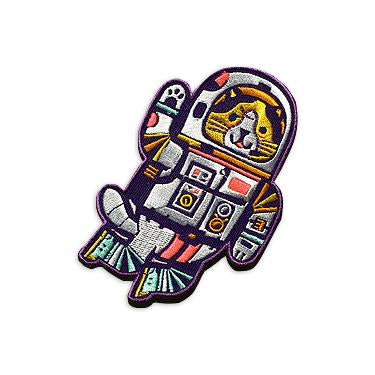 By Little Friends of Printmaking. ZOOM! Stitch this embroidered Astro Cat Patch onto your jacket (or sure, just iron him on, you lazybones) and let him bravely accompany you on all your adventures (in outer space, or at the beach, or at the movies)! Measures 3 x 4.5 inches.