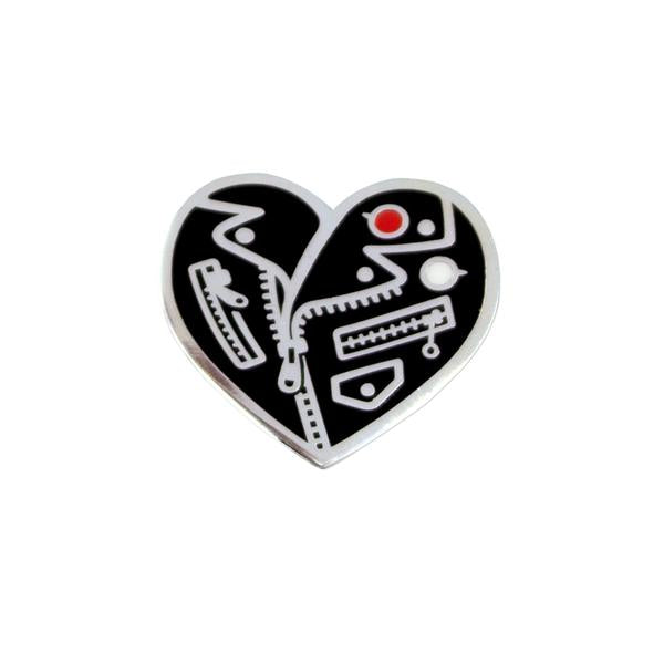 by Little Friends of Printmaking. Tough Love Pin. Pin comes with one rubber clutch. Measures 1.25 x 1.25 inches. Also available in store at FOLD Gallery DTLA.