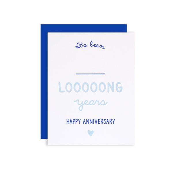 By Loudhouse Creative. Anniversary Write In Card features two-color letterpress printing, hand-drawn illustrations, 100% brilliant white cotton paper, blank inside and matching blue envelope cello sleeve packaging. Hand-printed on an antique letterpress in Los Angeles, California.