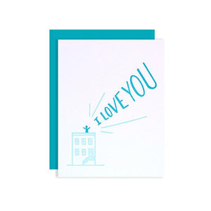 By Loudhouse Creative. I Love You Rooftop Card: two-color letterpress printing, hand-drawn illustrations, 100% brilliant white cotton paper, blank inside, matching teal envelope, cello sleeve packaging. Hand-printed on an antique letterpress in Los Angeles, California. Folded card measures 4.25 x 5.5 inches. Also available in store at FOLD Gallery DTLA.