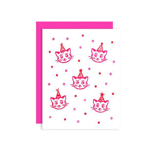 By Loudhouse Creative. Party Cats Card: two-color letterpress printing, hand-drawn illustrations, 100% brilliant white cotton paper, blank inside, matching pink envelope, cello sleeve packaging. Hand-printed on an antique letterpress in Los Angeles, California. Folded card measures 4.25 x 5.5 inches. Also available in store at FOLD Gallery DTLA