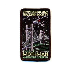 By Maiden Voyage Clothing Co. Mothman Rectangle (Bridge) Patch: This Cryptozoology Tracking Society patch is reminiscent of the old fashioned National Park patches, but features a cryptid character in their natural habitat! Show your support for the Cyrptozoology Tracking Society! Iron-on (sewing still recommended). Also available in store at FOLD Gallery DTLA.