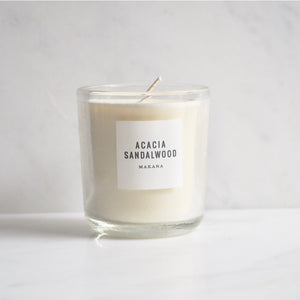 By Makana Candles. Acacia Sandlewood Candle: A composition of sultry sandalwood, oud and acacia, ever so softened by warmed vanilla and tonka. Hand-poured in-house in small batches using simple, clean ingredients – 100% soy wax, lead-free cotton wicking, and phthalate-free fragrances blended with pure essential oils.