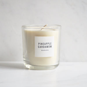 By Makana Candles Pineapple Cardamom Candle: This refreshing scent starts with pineapple, revealing a hint of calamansi lime. Spicy-sweet notes of cardamom and black pepper are uncovered and finished with creamy vanilla. Hand-poured in-house in small batches using simple, clean ingredients.