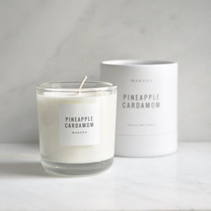 By Makana Candles Pineapple Cardamom Candle: This refreshing scent starts with pineapple, revealing a hint of calamansi lime. Spicy-sweet notes of cardamom and black pepper are uncovered and finished with creamy vanilla. Hand-poured in-house in small batches using simple, clean ingredients.