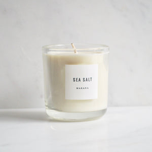 By Makana Candles Sea Salt Candle: Traveling across thousands of miles, tropical trade winds carry notes of fresh sea salt with hints of lush island foliage and flora. This fragrance is reminiscent of warm, breezy coastal days when beyond the horizon, the sky magically meets the sea.