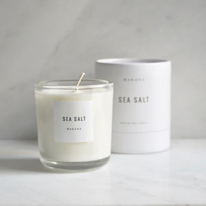 By Makana Candles Sea Salt Candle: Traveling across thousands of miles, tropical trade winds carry notes of fresh sea salt with hints of lush island foliage and flora. This fragrance is reminiscent of warm, breezy coastal days when beyond the horizon, the sky magically meets the sea.