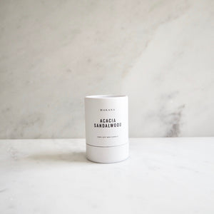 By Makana Candles. Acacia Sandlewood Candle: A composition of sultry sandalwood, oud and acacia, ever so softened by warmed vanilla and tonka. Hand-poured in-house in small batches using simple, clean ingredients – 100% soy wax, lead-free cotton wicking, and phthalate-free fragrances blended with pure essential oils.