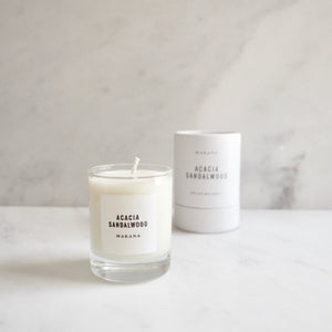 By Makana Candles. Acacia Sandlewood Candle: A composition of sultry sandalwood, oud and acacia, ever so softened by warmed vanilla and tonka. Hand-poured in-house in small batches using simple, clean ingredients – 100% soy wax, lead-free cotton wicking, and phthalate-free fragrances blended with pure essential oils.
