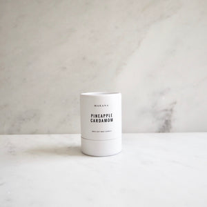 By Makana Candles Pineapple Cardamom Candle: This refreshing scent starts with pineapple, revealing a hint of calamansi lime. Spicy-sweet notes of cardamom and black pepper are uncovered and finished with creamy vanilla. Hand-poured in-house in small batches using simple, clean ingredients.