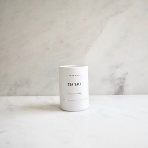 By Makana Candles Sea Salt Candle: Traveling across thousands of miles, tropical trade winds carry notes of fresh sea salt with hints of lush island foliage and flora. This fragrance is reminiscent of warm, breezy coastal days when beyond the horizon, the sky magically meets the sea.