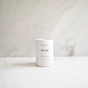 By Makana Candles. Tea Leaf Candle: Gestures of lemon verbena, ginger, white tea, and sage provide a clean and luxurious aroma, creating tranquility and sophistication. Hand-poured in-house in small batches using simple, clean ingredients – 100% soy wax, lead-free cotton wicking, and phthalate-free fragrances.