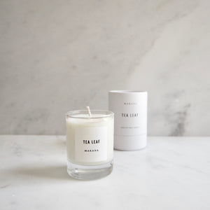 By Makana Candles. Tea Leaf Candle: Gestures of lemon verbena, ginger, white tea, and sage provide a clean and luxurious aroma, creating tranquility and sophistication. Hand-poured in-house in small batches using simple, clean ingredients – 100% soy wax, lead-free cotton wicking, and phthalate-free fragrances.