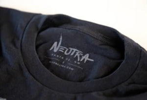 By Max Nuetra. At first glance, this may look like a simple giraffe shirt, but look again and you may notice the expression that I meticulously honed on its face. This is more than just a giraffe shirt. The giraffe is an ambassador of a certain vibe. An easy going acknowledgment. "Hello there." I see you too, and it's all groovy. A more subtle grey ink, custom labeling inside the collar, and a coy little bunny on the back of the neck raise the game for this unique piece of apparel.