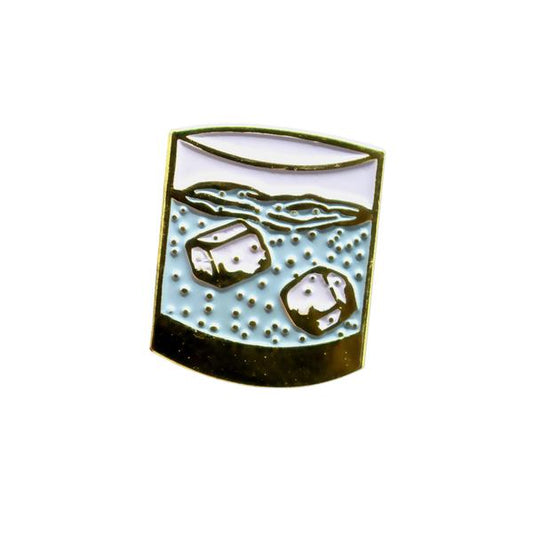 by Paid Vacation. Enamel Rocks Glass Pin with rubber clutch back. Measures 0.75 x 1 inch. Also available in store at FOLD Gallery DTLA.