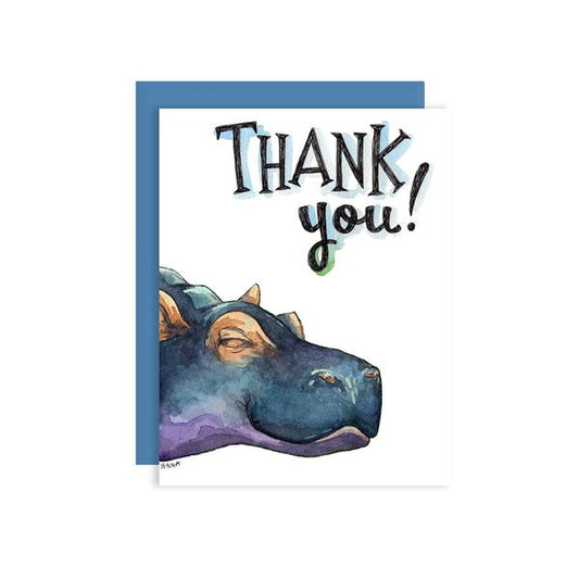 By Paper Wilderness. Let them know how happy they made you with this sweet Hippo Thank You Card! Original watercolor illustration printed on 100 lb. premium cover paper. Blank inside for your message. Comes with a blue paper envelope in a protective cellophane sleeve. Measures 4.25 x 5.5 inches. Also available in store at FOLD Gallery DTLA.