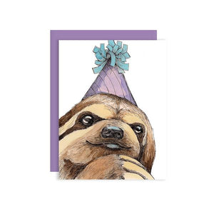 By Paper Wilderness. Party Sloth Card.Sloths love hanging out, bring this guy to the next birthday, special event, or any celebratory occasion! Original watercolor illustration printed on 100 lb. premium cover bristol paper. Blank inside for your message. Comes with a purple paper envelope. Measures 4.25 x 5.5 inches. Also available in store at FOLD Gallery DTLA.