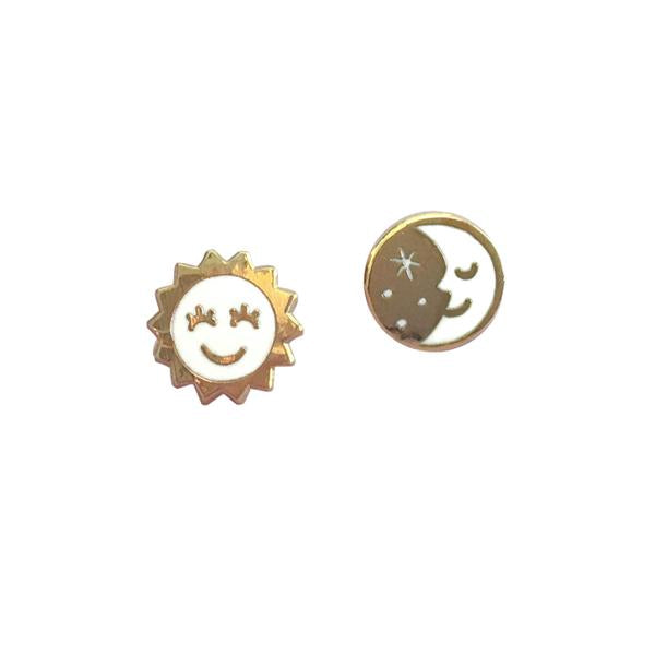 By Rather Keen. Sun and Moon Stud Earrings. ♫ But when the sun goes down. And the moon comes through. To the monotone of the evening's drone. I'm all alone with you ♫—Ella Fitzgerald. 22k gold plated stud earrings. Nickel-Free! Measures 11mm wide. Also available in store at FOLD Gallery DTLA.